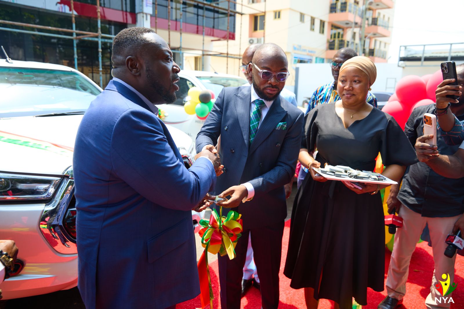 MYDE Hands Over 16 Pickup Vehicles to National Youth Authority